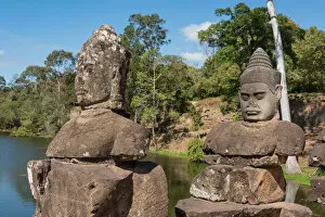 Images Dated 23rd December 2015: Statues on bridge at Angkor Thom South gate, towards the Bayon Temple, Siem Reap, Cambodia