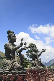 Worshipping Prints: Statues of Devas making offerings at Tian Tan Buddha image at Po Lin Monastery