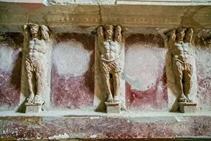 Pompeii Prints: Statues of men carved into a wall, Pompeii
