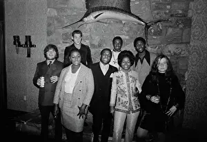 Prints of R&B band Booker T and the MG's pose with American blues and soul singer Janis Joplin, soul singer Carla Thomas and others at the Stax Records Christmas party in Memphis, Tennessee Classic Prints of Iconic Janis Joplin: Stax Party