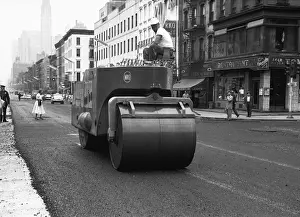 Steam roller on street, (B&W)
