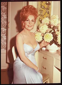 Stella Stevens Posing with Flowers