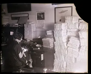 Stenographer Working at Cluttered Desk