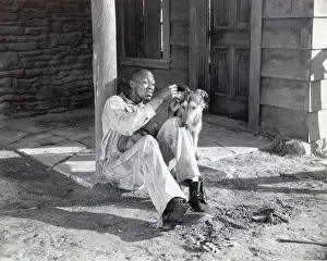 Stepin Fetchit Counting Sitting With Dog