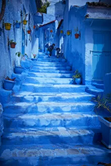 Tourist Gallery: Steps of colorful blue historical village