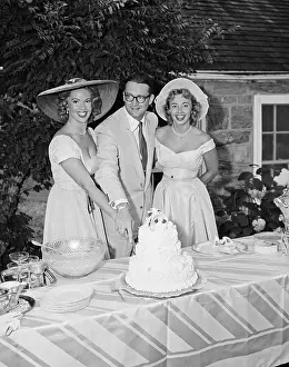 Newlyweds Prints: Steve Allen and Jayne Meadows Cut Wedding Cake