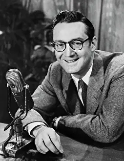 Steve Allen Sitting at Microphone