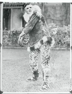 Steve Chekaluk Wearing Native Attire and in Pitching Stance