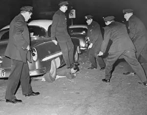 Steven Montenez Lying Under Car with Policeman's Foot on His Neck
