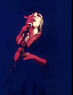 Prints of OCTOBER 1977: Singer Stevie Nicks of the rock and roll group Fleetwood Mac performs onstage in October 1977. (Photo by Michael Ochs Archives/Getty Images) Go Your Own Way: A Visual Celebration of Rock’s Most Enchanting and Enduring Band: Stevie Nicks Performing