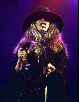 Prints of OCTOBER 1977: Singer Stevie Nicks of the rock and roll group Fleetwood Mac performs onstage in October 1977. (Photo by Michael Ochs Archives/Getty Images) Go Your Own Way: A Visual Celebration of Rock’s Most Enchanting and Enduring Band: Stevie Nicks Performing