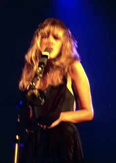 Prints of OCTOBER 1977: Singer Stevie Nicks of the rock and roll group Fleetwood Mac performs onstage in October 1977. (Photo by Michael Ochs Archives/Getty Images) Go Your Own Way: A Visual Celebration of Rock’s Most Enchanting and Enduring Band: Stevie Nicks Performing