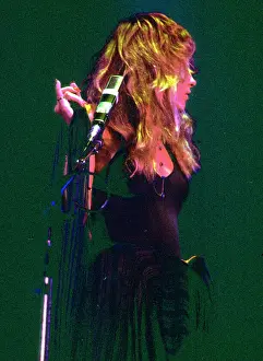 Prints of OCTOBER 1977: Singer Stevie Nicks of the rock and roll group Fleetwood Mac performs onstage in October 1977. (Photo by Michael Ochs Archives/Getty Images) Go Your Own Way: A Visual Celebration of Rock’s Most Enchanting and Enduring Band: Stevie Nicks Performing