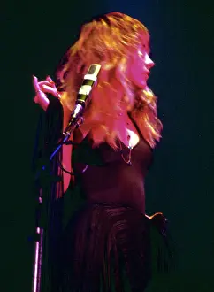 Prints of OCTOBER 1977: Singer Stevie Nicks of the rock and roll group Fleetwood Mac performs onstage in October 1977. (Photo by Michael Ochs Archives/Getty Images) Go Your Own Way: A Visual Celebration of Rock’s Most Enchanting and Enduring Band: Stevie Nicks Performing