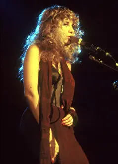 Prints of DECEMBER 1979: Singer Stevie Nicks of the rock and roll group Fleetwood Mac performs onstage in December 1979. (Photo by Michael Ochs Archives/Getty Images) Go Your Own Way: A Visual Celebration of Rock’s Most Enchanting and Enduring Band: Stevie Nicks Performing
