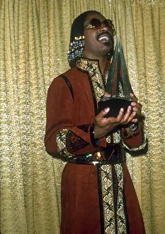 Prints of Musician Stevie Wonder attends the Billboard Music Awards on December 11, 1977 in Santa Monica, California. Photo by Michael Ochs Archives/Getty Images) Visions of Wonder: Iconic Moments Captured: Stevie Wonder At The Billboard Music Awards