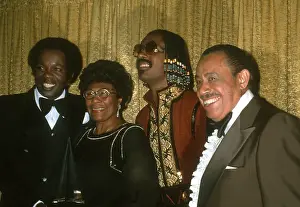 Prints of Performers Lou Rawls, Ella Fitzgerald Stevie Wonder and Cab Calloway attend the Billboard Music Awards on December 11, 1977 in Santa Monica, California. Photo by Michael Ochs Archives/Getty Images) Visions of Wonder: Iconic Moments Captured: Stevie Wonder At The Billboard Music Awards