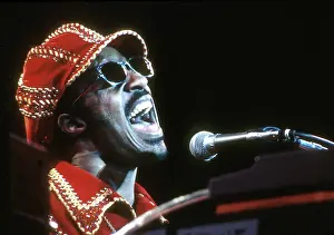 Prints of American musician Stevie Wonder performs onstage, November 1974. (Photo by Michael Ochs Archives/Getty Images) Visions of Wonder: Iconic Moments Captured: Stevie Wonder Performing in Red Hat