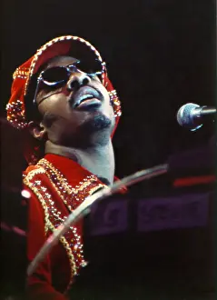 Prints of American musician Stevie Wonder performs onstage, November 1974. (Photo by Michael Ochs Archives/Getty Images) Visions of Wonder: Iconic Moments Captured: Stevie Wonder Performing in Red Hat
