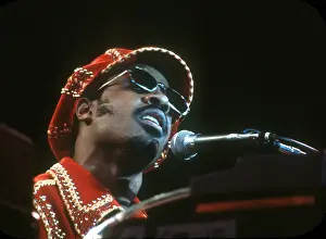 Prints of American musician Stevie Wonder performs onstage, November 1974. (Photo by Michael Ochs Archives/Getty Images) Visions of Wonder: Iconic Moments Captured: Stevie Wonder Performing in Red Hat
