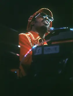 Prints of American musician Stevie Wonder performs onstage, November 1974. (Photo by Michael Ochs Archives/Getty Images) Visions of Wonder: Iconic Moments Captured: Stevie Wonder Performing in Red Hat
