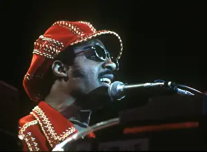 Prints of American musician Stevie Wonder performs onstage, November 1974. (Photo by Michael Ochs Archives/Getty Images) Visions of Wonder: Iconic Moments Captured: Stevie Wonder Performing in Red Hat