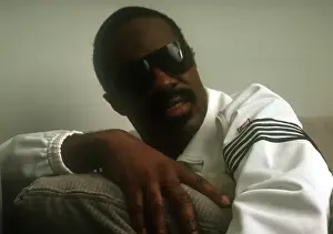 Prints of Musician Stevie Wonder poses for a portrait session on a couch wearing a white track suit at home in 1984. (Photo by Michael Ochs Archives/Getty Images) Visions of Wonder: Iconic Moments Captured: Stevie Wonder Portrait Session At Home