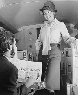 Vancouver Prints: Stewardess Modeling New Uniform