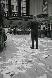Stock Exchange Janitor Looking at Trading Aftermath