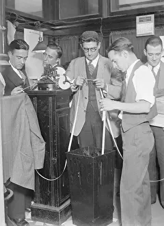Three Quarter Length Prints: Stock Market Workers Look @ Ticker Tape