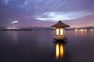 Images Dated 26th December 2015: A stone lantern on the West Lake, Hangzhou