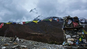 Himalayas Collection: Stone marker with Buddhist prayer flags, Everest base camp trek, Sagarmatha National Park