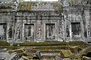 Stone wall engraving at Ta Prohm temple Angkor Cambodia