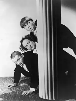 Comic Team Prints: Three Stooges Peer Around Column