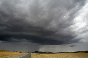 Landscap Prints: Storm Clouds Gathering Over a Road and Fields