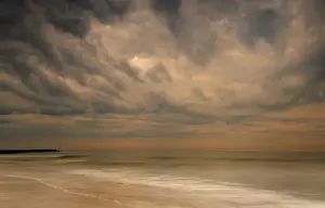 Stormy seascape at sunrise, Cape May National Seashore, New Jersey, USA