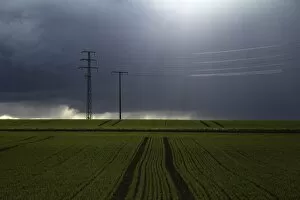 Images Dated 12th May 2013: Stormy sky over fields with electricity pylons, Biberach, Upper Swabia, Baden-Wuerttemberg, Germany