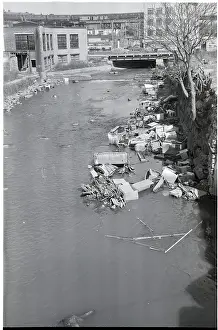 Stream Polluted with Automotive and Household Waste
