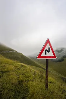 Street sign on the way to the Forca di Presta pass, Monte Sibillini, Apennines Mountains, Marche, Italy, Europe Street sign on the way to the Forca di Presta pass, Monte Sibillini, Apennines Mountains, Marche, Italy, Europe