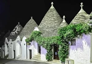 Images Dated 4th June 2015: Street full of trulli houses at night, Alberobello