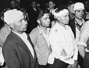 Injury Prints: Strike Riot's Aftermath -- Bandaged Prisoners in Court