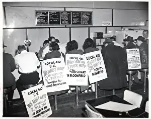 Picketing Prints: Strikers with Picket Signs Eat at Diner