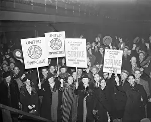 Strikers with Signs and Hats Held Aloft at Rally