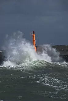 Surge Collection: Strong waves with spray in a storm at the pier of Hvide Sande, Jutland, Denmark, Europe