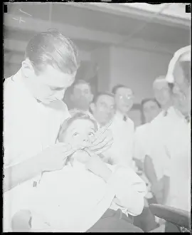 Dentistry Prints: Student Dentist with Child Patient