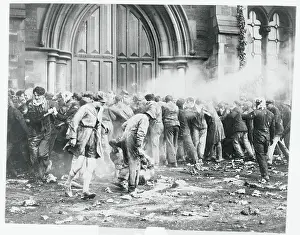 University Prints: Students and Debris in Front of Building