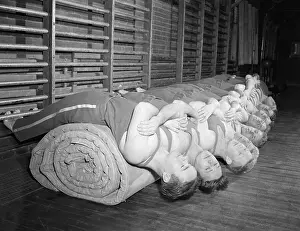 Stomach Prints: Students Doing Abdominal Excercises on Rolled Mat