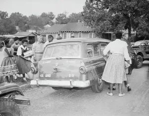 Station Wagon Prints: Students Entering Army Vehicle