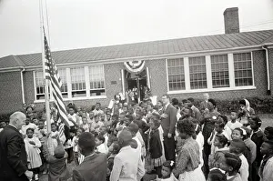 Students Hoisting American Flag