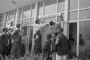 Front Door Prints: Students Posting a Sign on Door